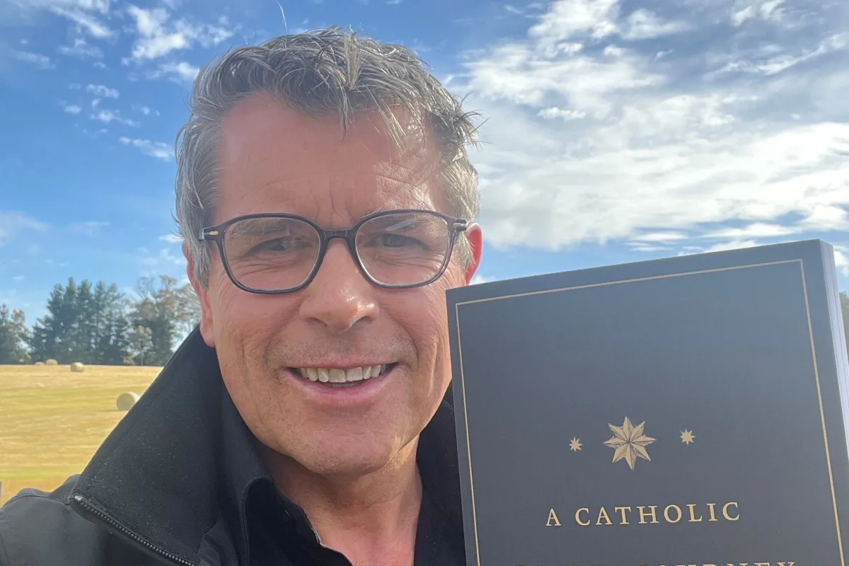 Hand on First Physical Copy of First Book